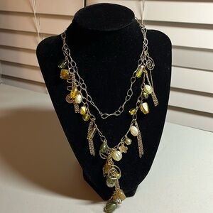 Charm necklace with earth, tone beads